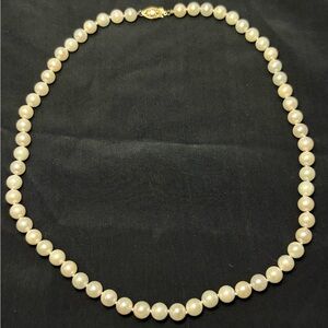 Hand knotted pearl necklace with 14k gold clasp